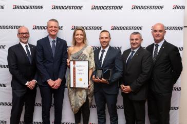 Bridgestone named Bridgestone Select Enoggera as its National Franchise of the Year: L-R: Darren Denley, Rob Salter, Emily and Damien Meneguzzo, Heath Barclay, Tristan Briggs.