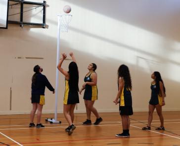 Bridgestone New Zealand has celebrated Olympic Day with a donation of sporting goods to an Auckland high school.